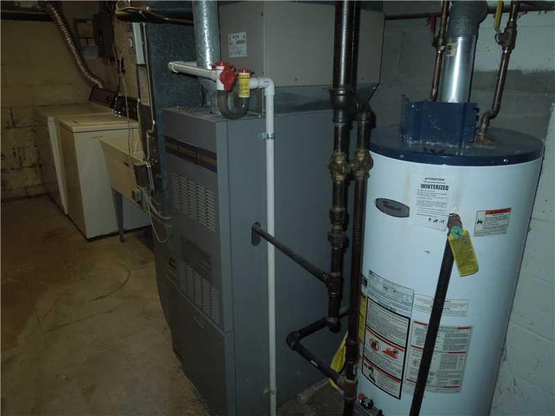 454 Hunting Creek Road Canonsburg, PA 15317 - Photo 14 of 19 Other. Basement Laundry Area, Gas Furnace, Hot Water Tank