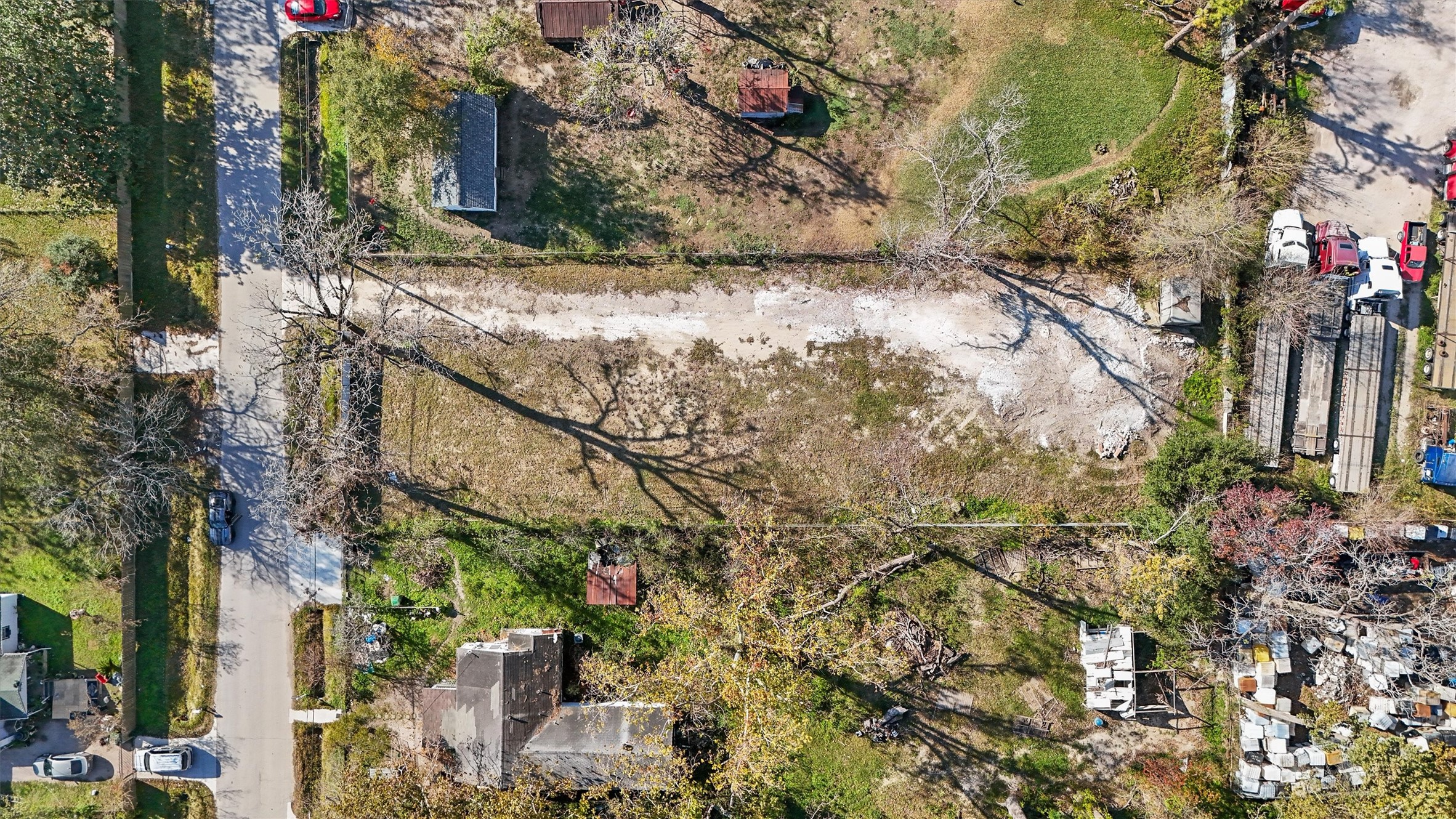 8533 Furray Road Houston, TX 77028 - Photo 12 of 14 a backyard of a house with lots of green space