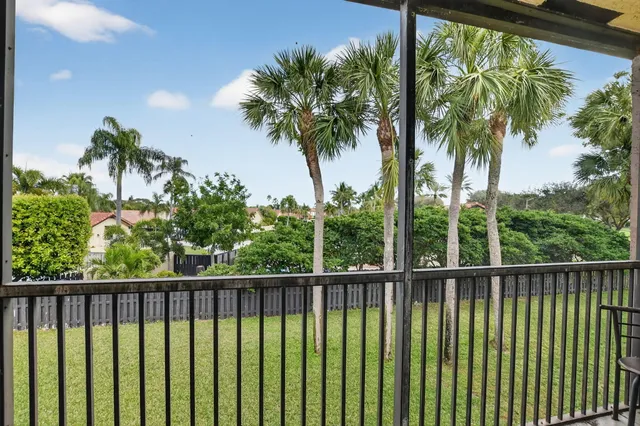 a view of a balcony with a plant