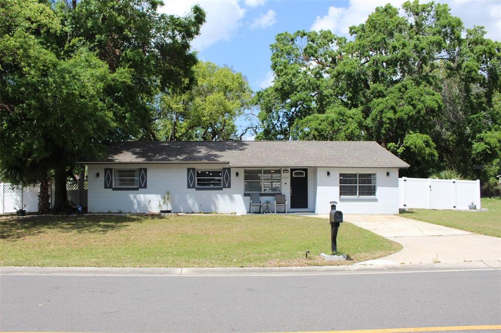a house view with a garden space