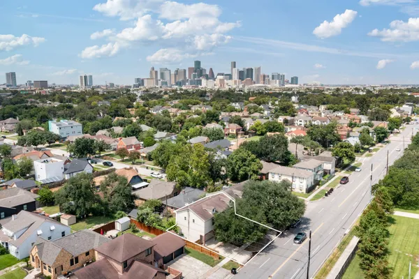 an aerial view of a city with lots of residential buildings