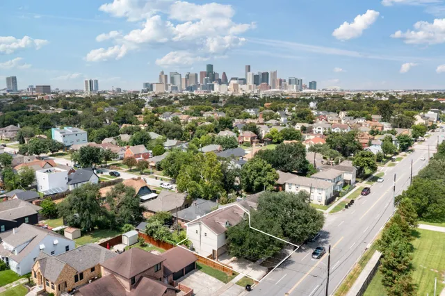 an aerial view of a city with lots of residential buildings