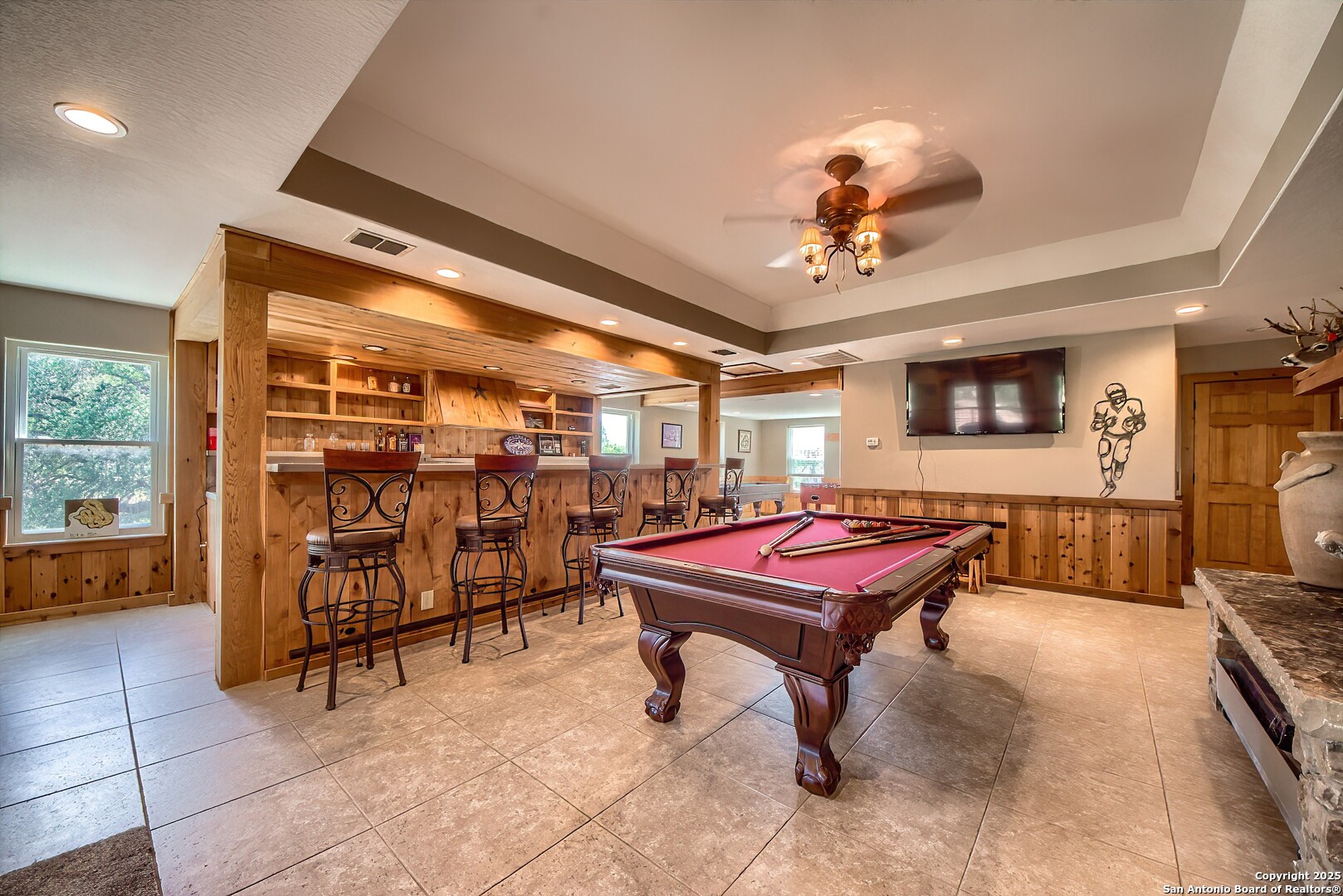 5464 Coughran Road Pleasanton, TX 78064 - Photo 11 of 55 a room with furniture and air hockey table