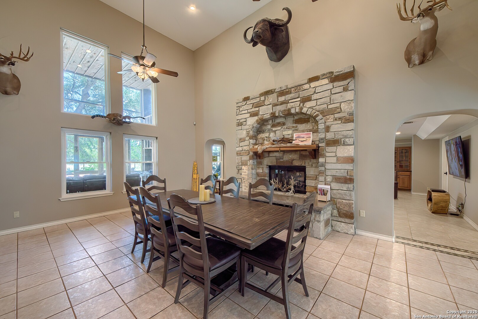 5464 Coughran Road Pleasanton, TX 78064 - Photo 23 of 55 a view of a dining room with furniture and chandelier