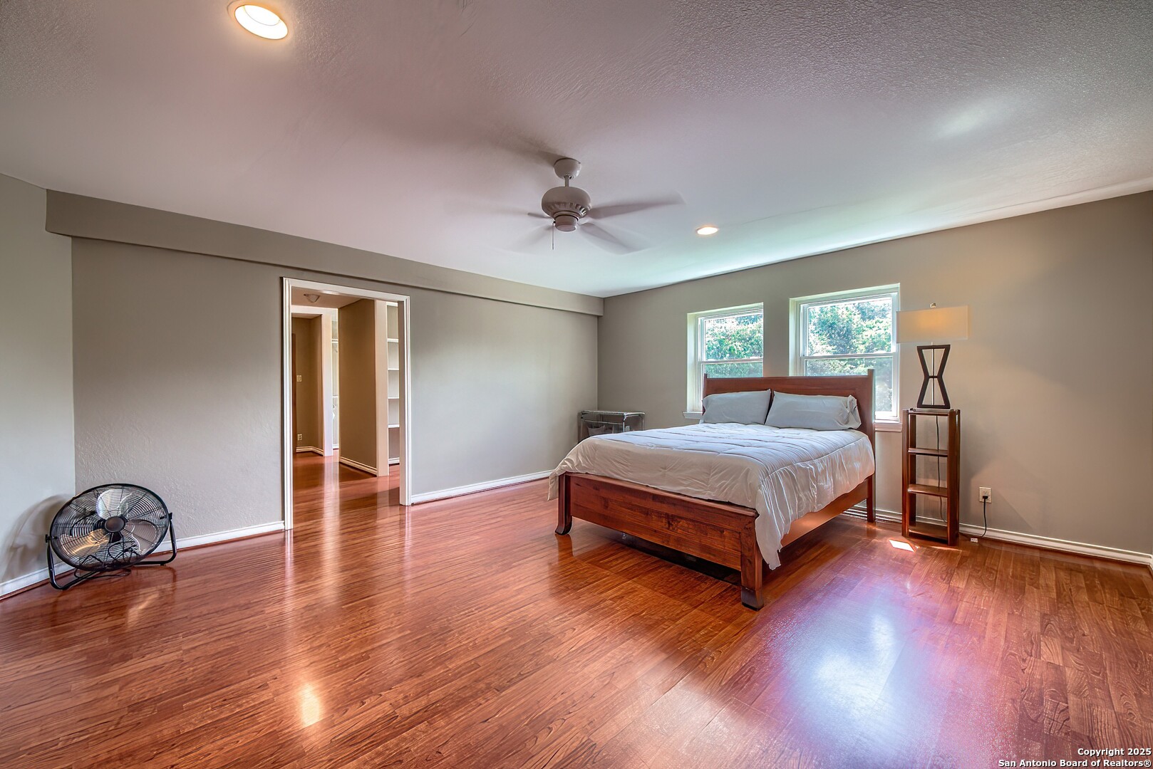 5464 Coughran Road Pleasanton, TX 78064 - Photo 38 of 55 a bedroom with a bed and window