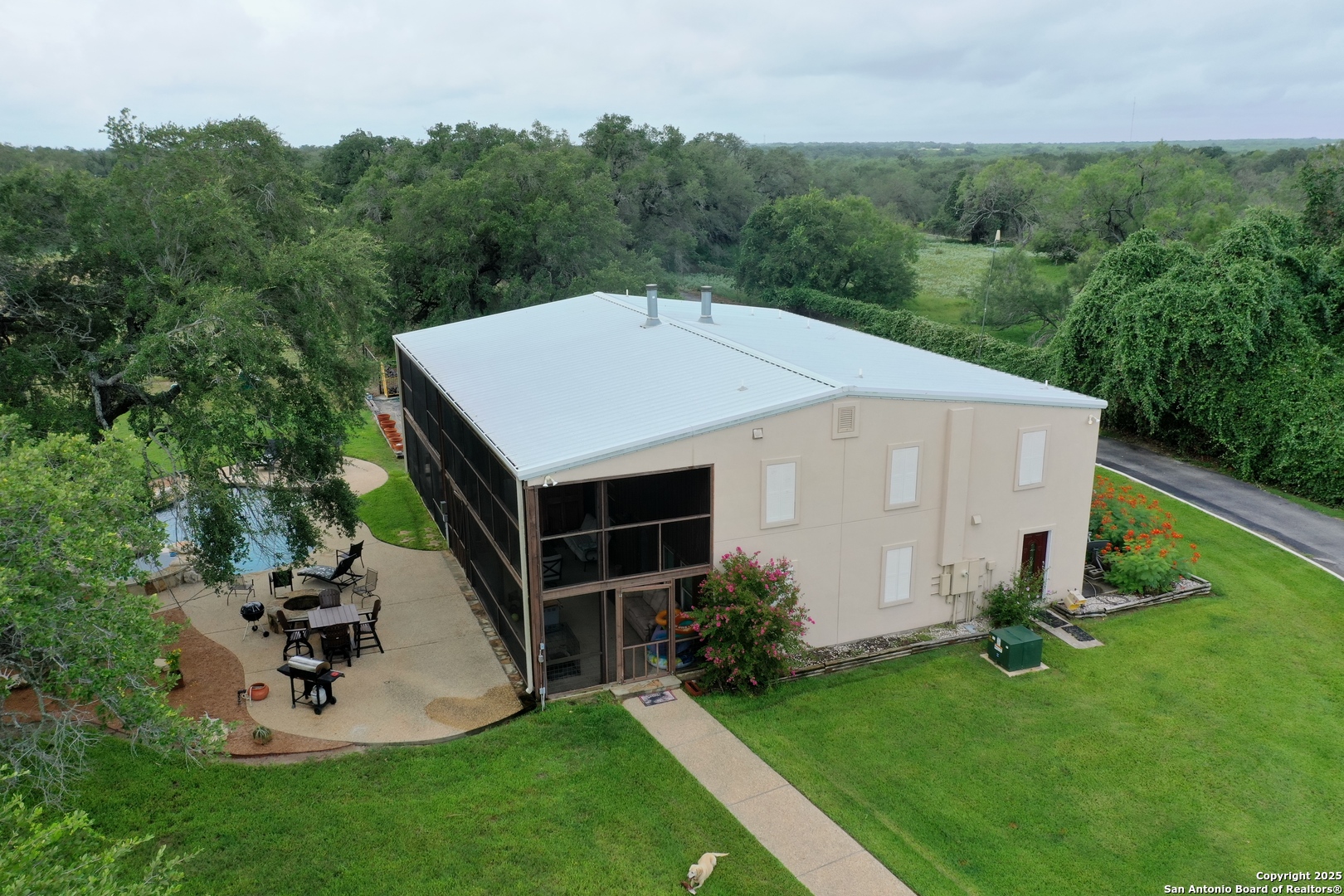 5464 Coughran Road Pleasanton, TX 78064 - Photo 5 of 55 a aerial view of a house with backyard and garden