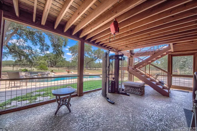 a view of a swimming pool with a backyard