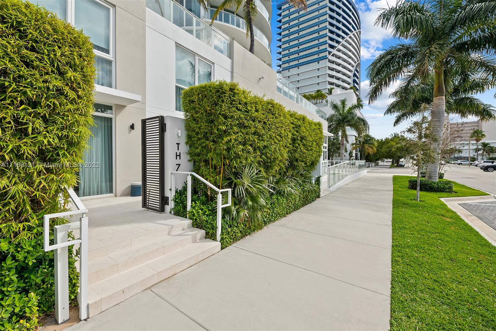 401 North Birch Road, Unit TH7 Fort Lauderdale, FL 33304 - Photo 17 of 29 a view of a garden with pathway