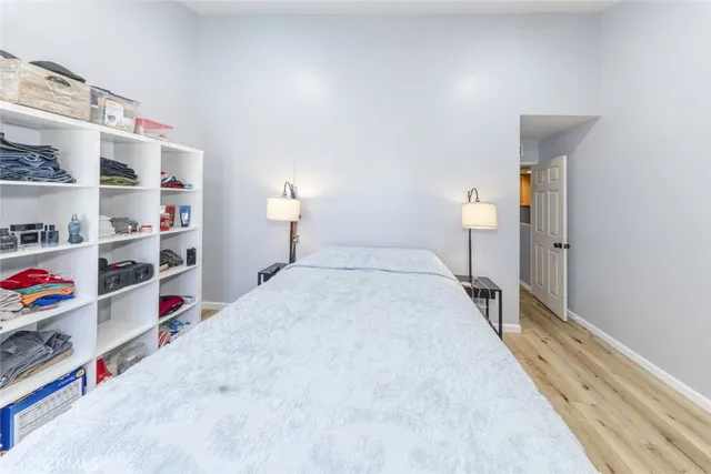 a bedroom with a bed and closet