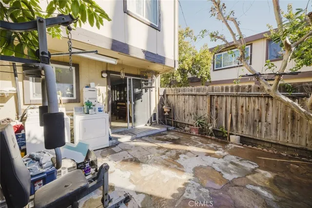 a view of a building with sitting area