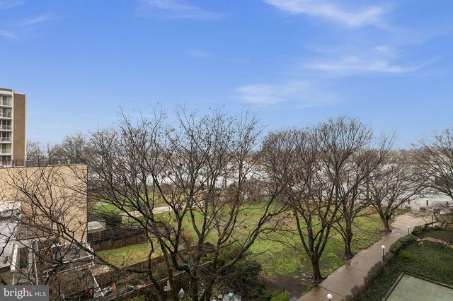 a view of a city with lots of trees