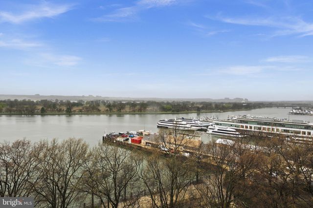 a view of a lake with a city