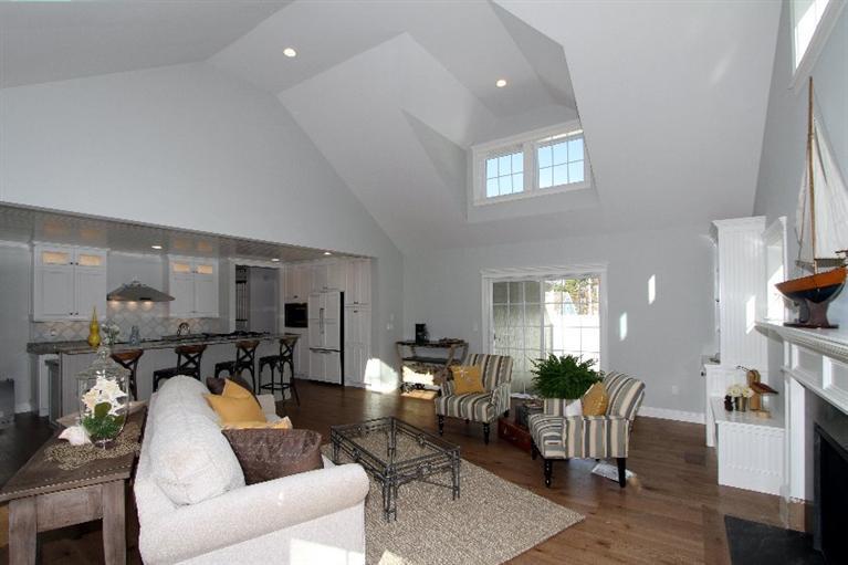 14 Cross Road Mashpee, MA 02649 - Photo 11 of 35 a living room with furniture and a table