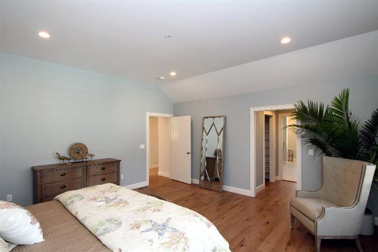14 Cross Road Mashpee, MA 02649 - Photo 21 of 35 a bedroom with a bed and furniture