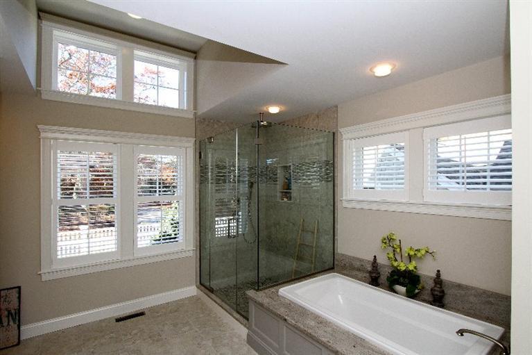 14 Cross Road Mashpee, MA 02649 - Photo 22 of 35 a bathroom with a sink a toilet and shower