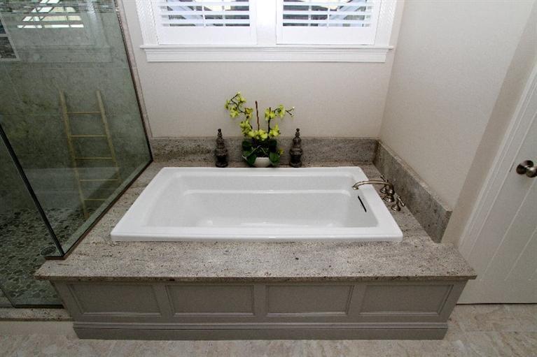 14 Cross Road Mashpee, MA 02649 - Photo 23 of 35 a bathroom with a granite countertop bathtub