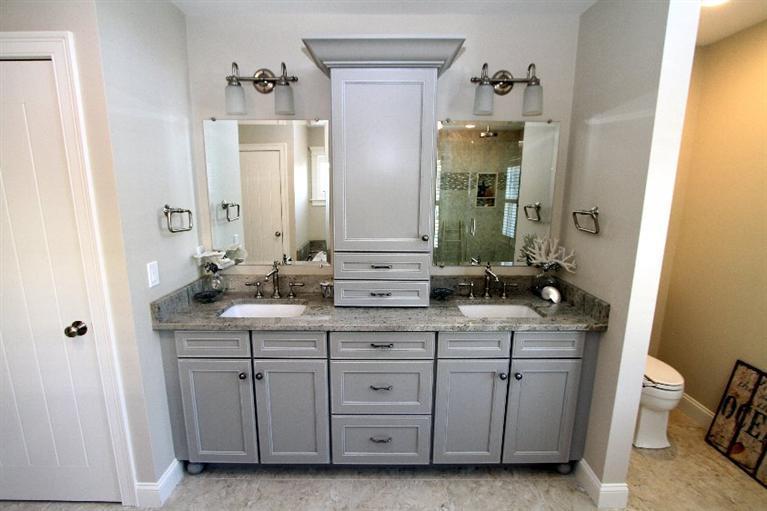 14 Cross Road Mashpee, MA 02649 - Photo 25 of 35 a bathroom with a double vanity sink and mirror