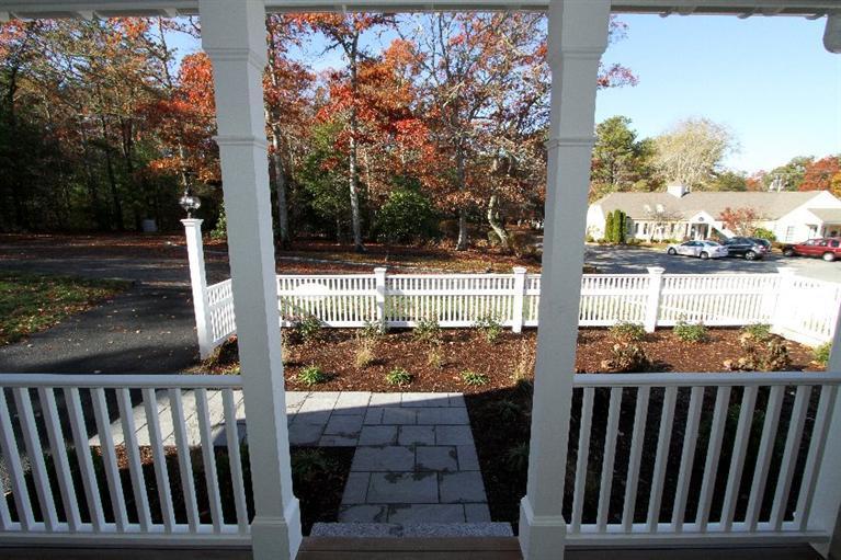14 Cross Road Mashpee, MA 02649 - Photo 29 of 35 a view of a porch with a yard