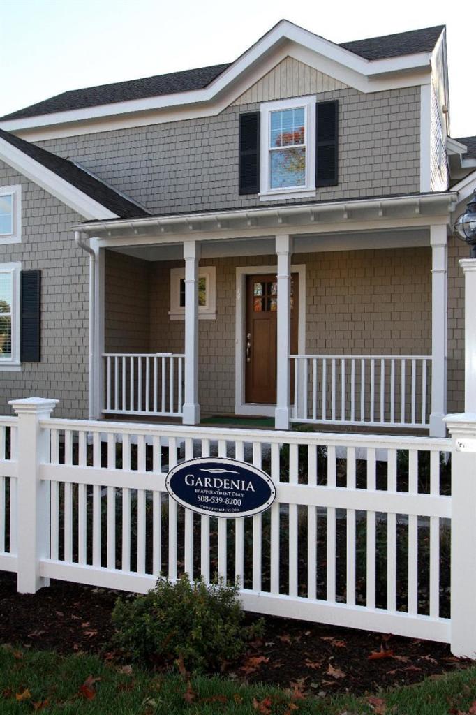 14 Cross Road Mashpee, MA 02649 - Photo 4 of 35 a front view of a house with garden