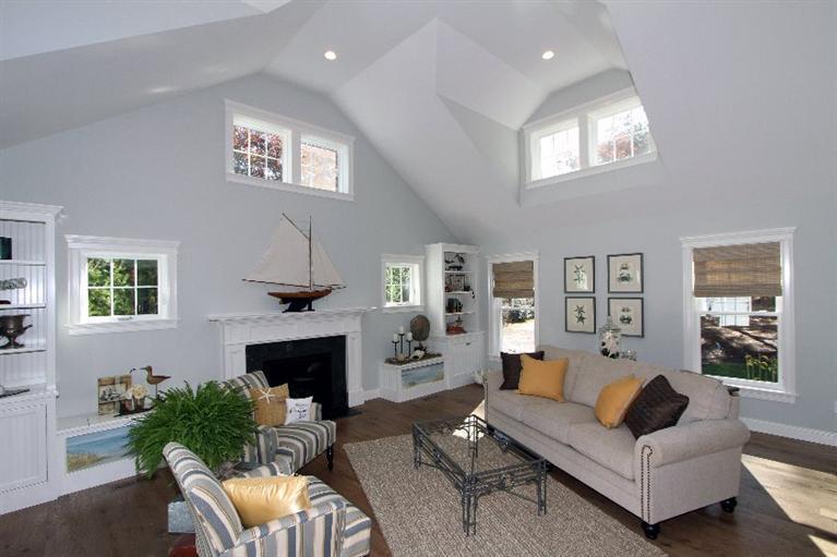 14 Cross Road Mashpee, MA 02649 - Photo 6 of 35 a living room with furniture a window and a fireplace