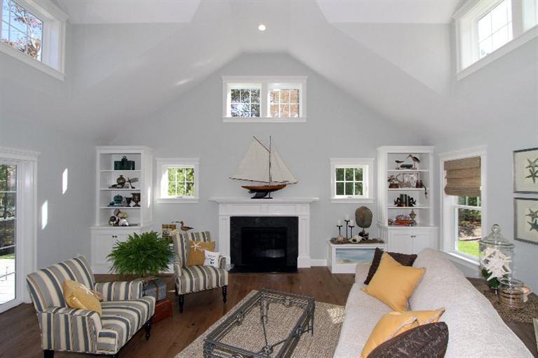 14 Cross Road Mashpee, MA 02649 - Photo 7 of 35 a living room with furniture fireplace and window