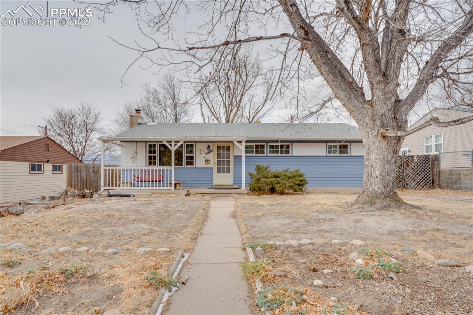 1932 Winston Road Colorado Springs, CO 80909 - Photo 1 of 23 Front of the home