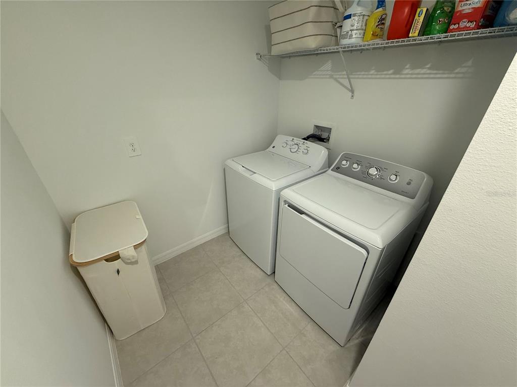 9276 Bonita Mar Drive Parrish, FL 34219 - Photo 13 of 54 a utility room with dryer and washer