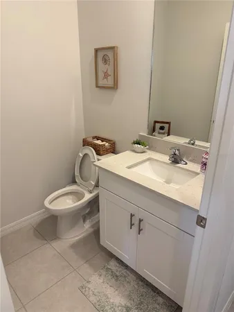 a bathroom with sink and mirror