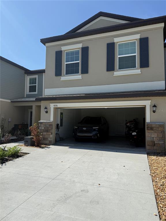 9276 Bonita Mar Drive Parrish, FL 34219 - Photo 23 of 54 a front view of house with yard
