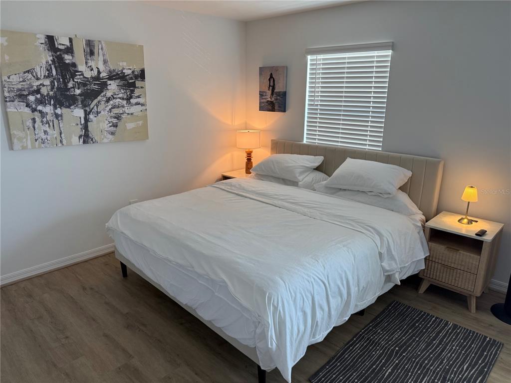 9276 Bonita Mar Drive Parrish, FL 34219 - Photo 29 of 54 a bedroom with bed and window