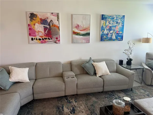 a living room with furniture and a couch