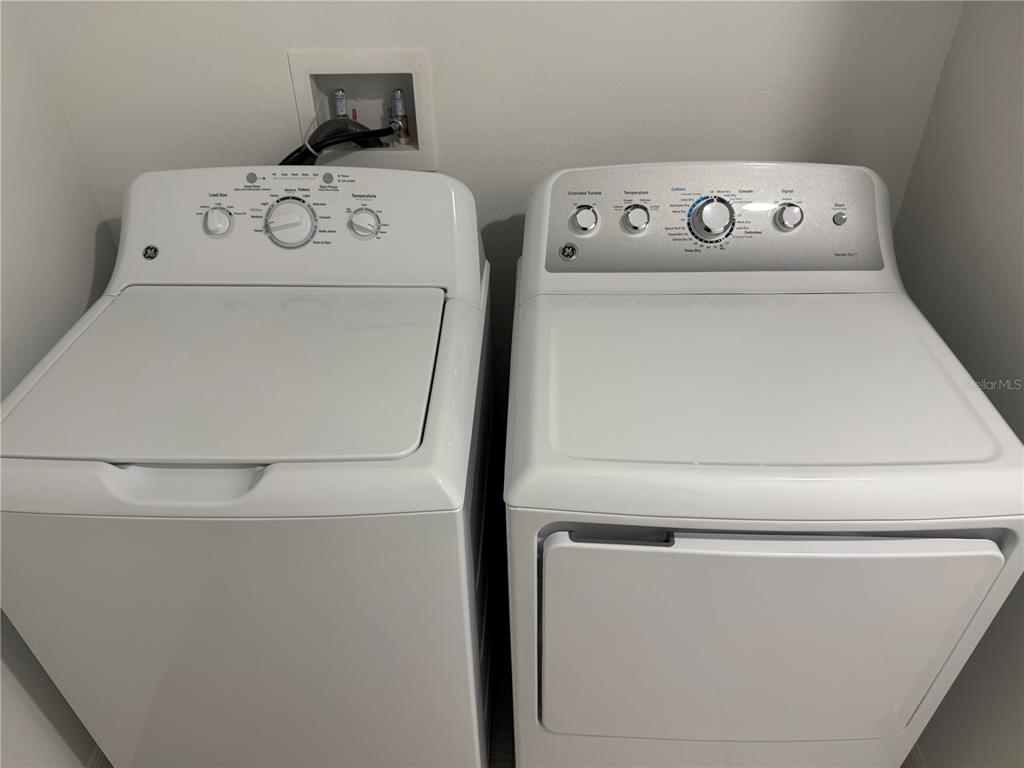 9276 Bonita Mar Drive Parrish, FL 34219 - Photo 53 of 54 a utility room with dryer and washer