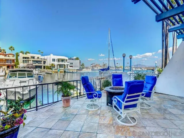 a view of a terrace with sitting area
