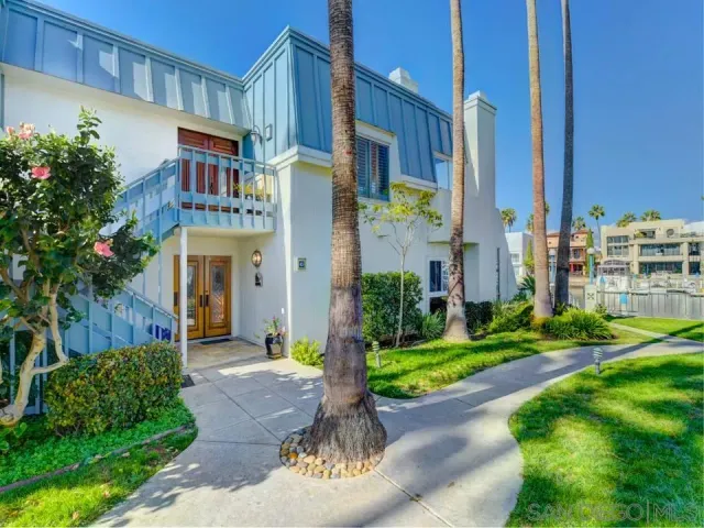 a front view of a building with garden