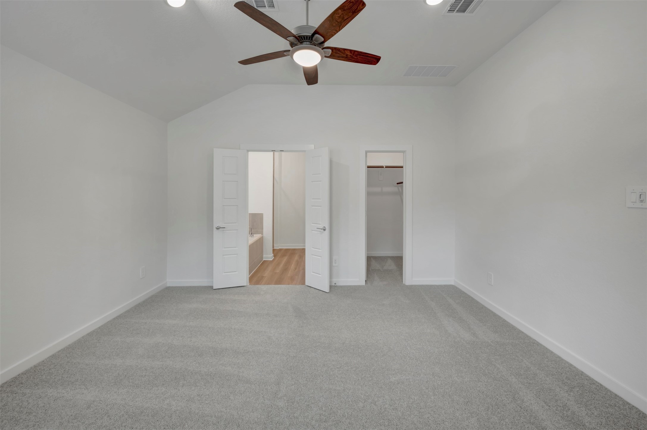 20534 Draper Road Tomball, TX 77377 - Photo 8 of 33 an empty room with closet and windows