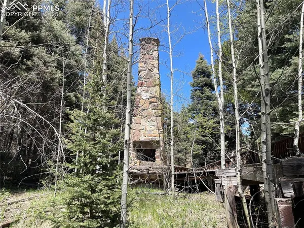 a balcony with next to a yard