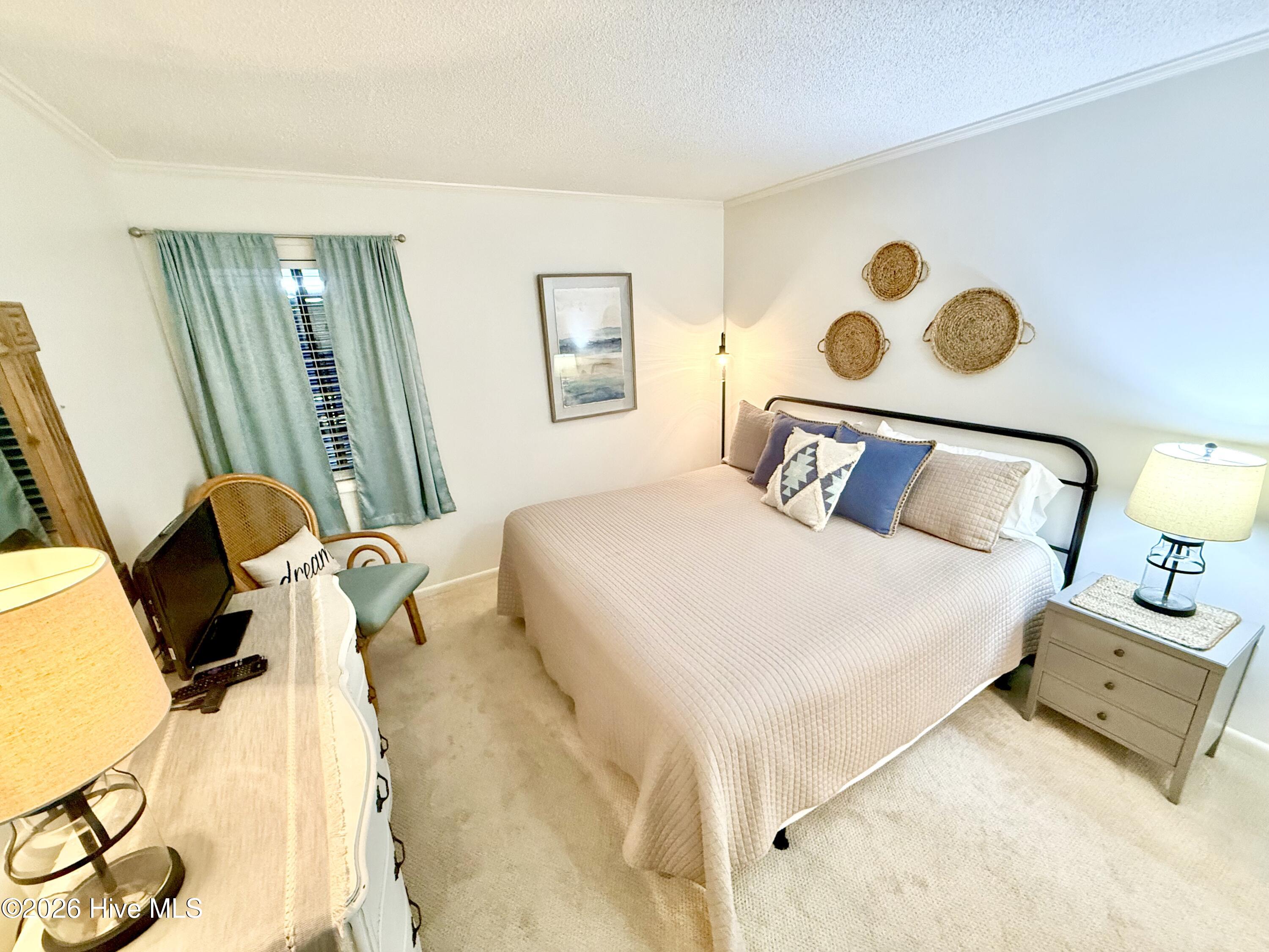 2511 West Fort Macon Road, Unit 211B Atlantic Beach, NC 28512 - Photo 11 of 38 Principal Bedroom