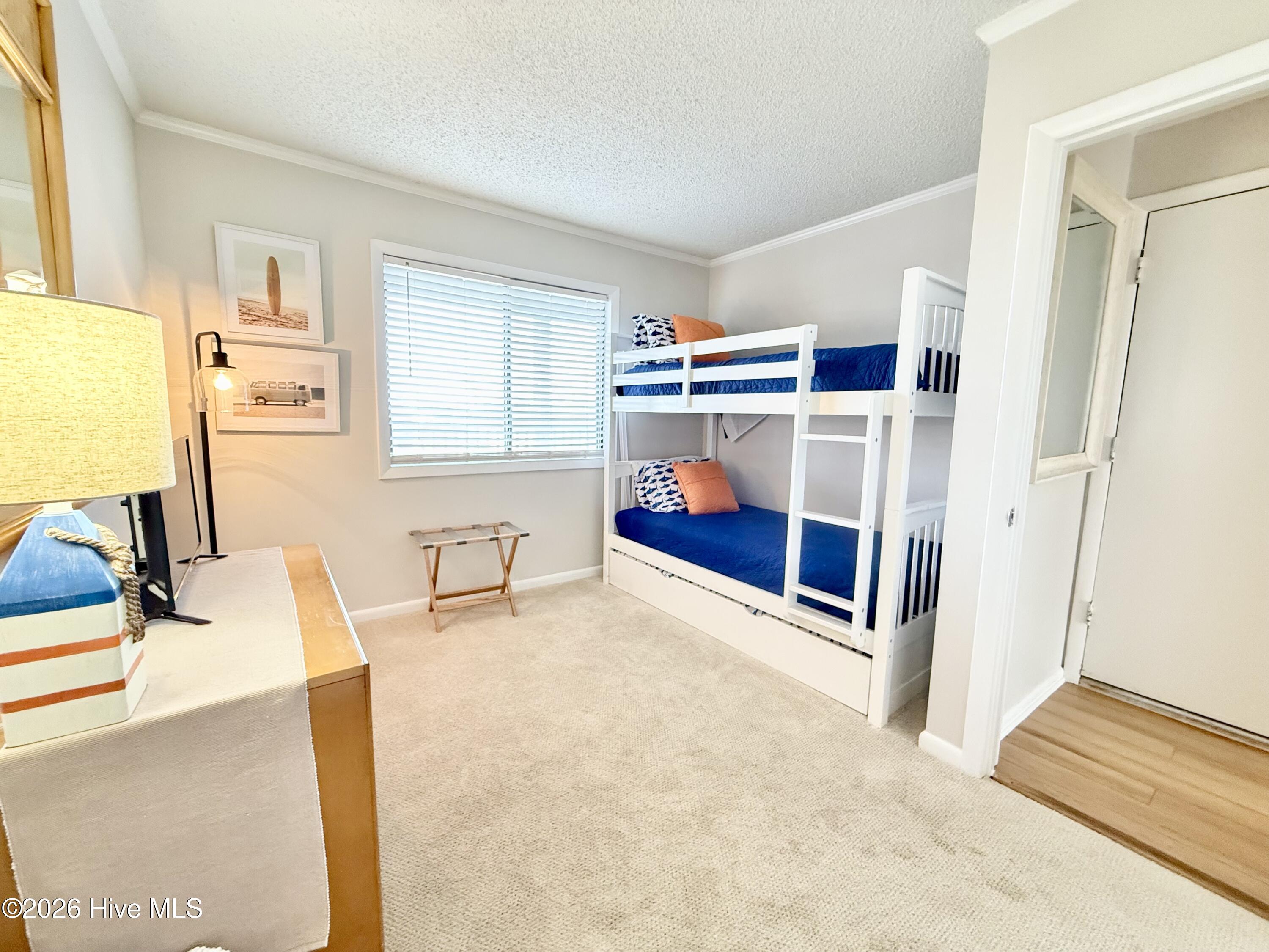 2511 West Fort Macon Road, Unit 211B Atlantic Beach, NC 28512 - Photo 15 of 38 Guest Bedroom