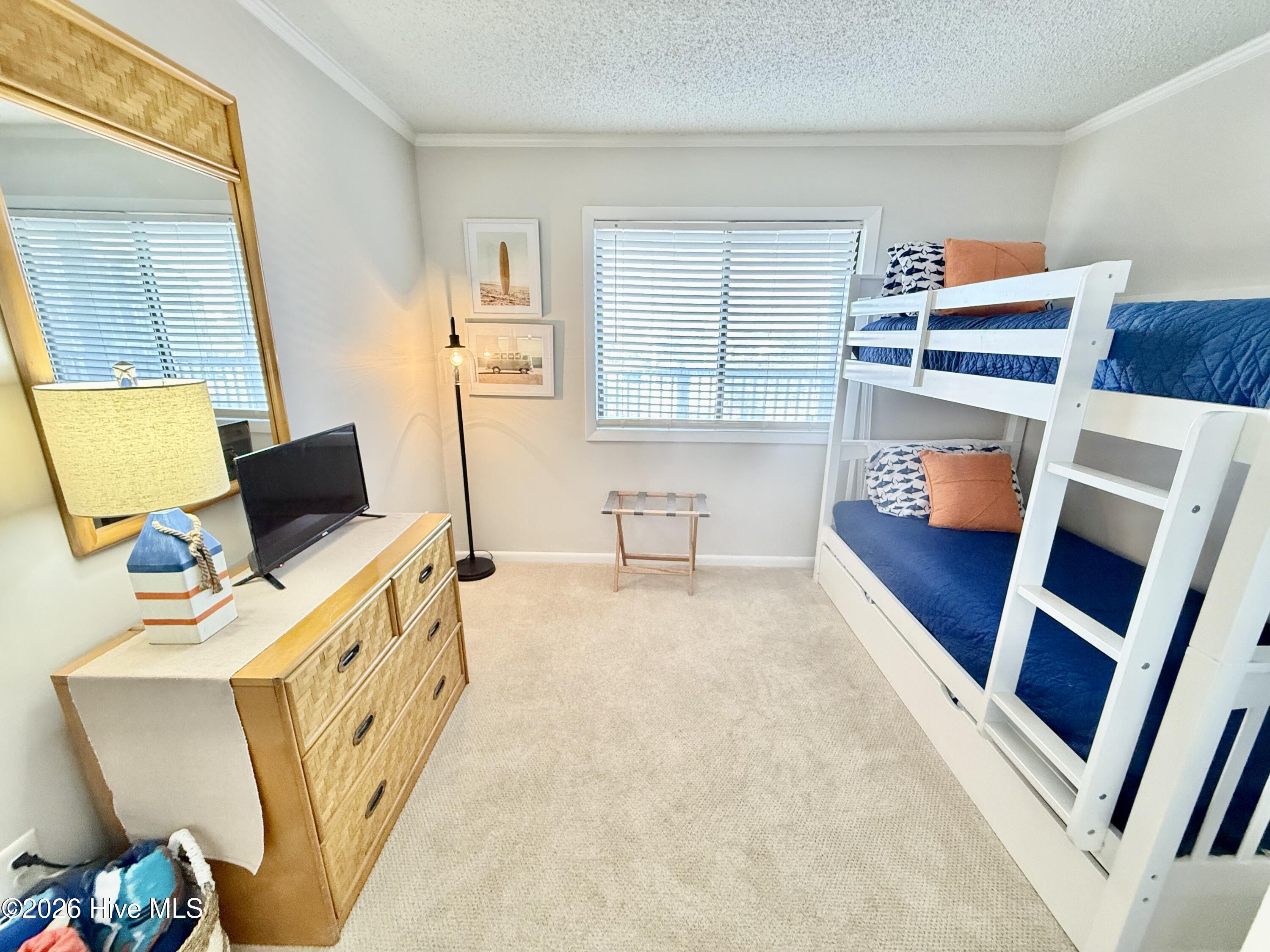 2511 West Fort Macon Road, Unit 211B Atlantic Beach, NC 28512 - Photo 16 of 38 Guest bedroom- view 2