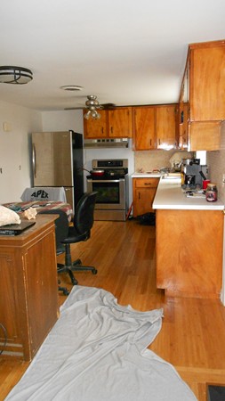 19 Leonard Road Sharon, MA 02067 - Photo 8 of 10 a kitchen with a sink appliances and a counter top space