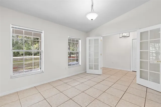 an empty room with windows