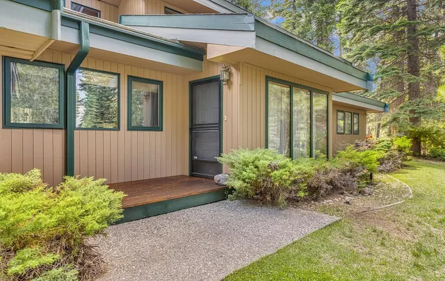 a front view of a house having yard