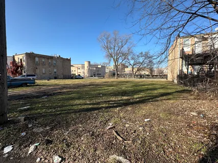 a view of houses with swimming pool
