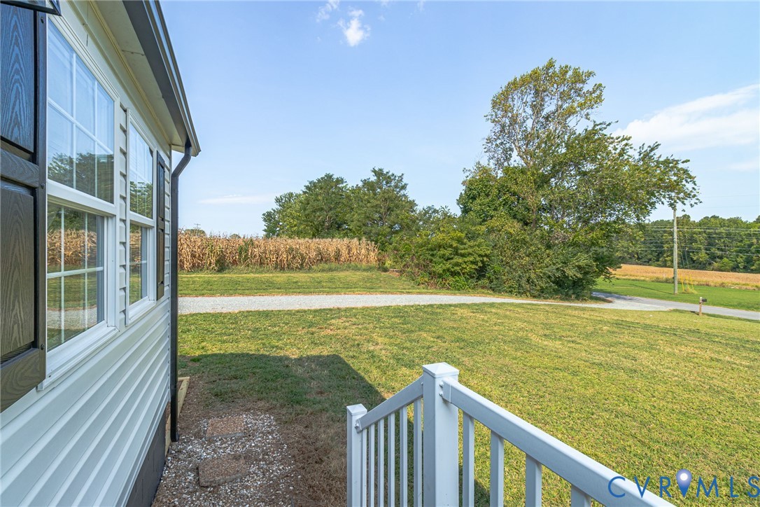 36 Bundick Road Lottsburg, VA 22511 - Photo 33 of 50 Exterior siding with white window frames and dark