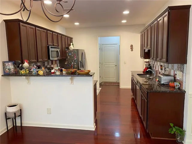 an aerial view of a house with a garden