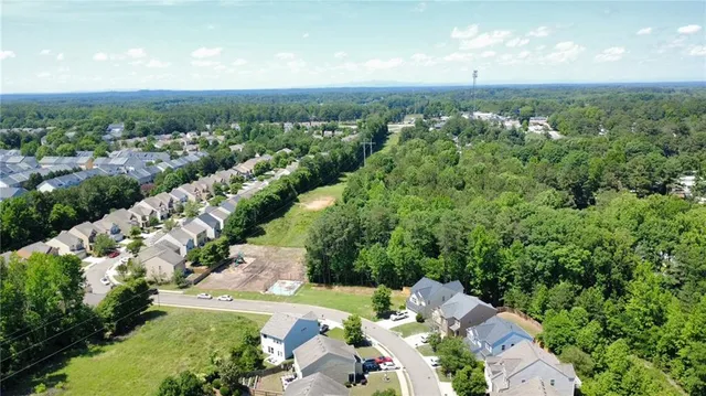 a bedroom with a bed and dresser
