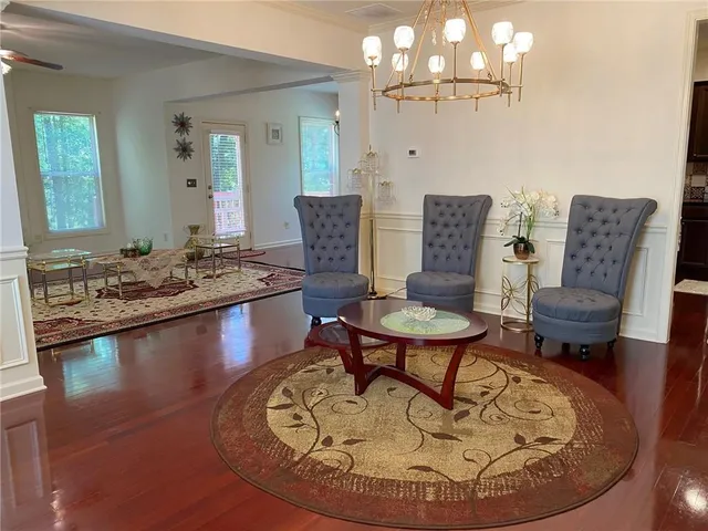 a kitchen with stainless steel appliances granite countertop a stove top oven a sink dishwasher and wooden cabinets