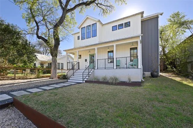 front view of a house with a yard