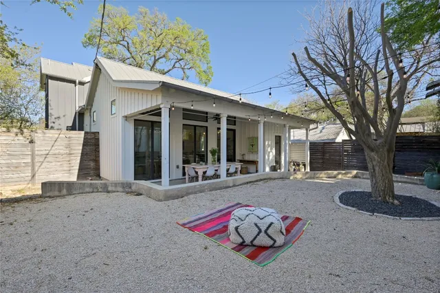 a view of a pool with a yard