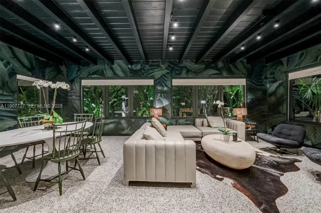 a outdoor space with patio furniture and potted plants